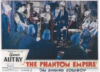 Gene Autry, Smiley Burnette, Frankie Darro, Bobby Nelson, Peter Potter, and Betsy King Ross in The Phantom Empire (1935)
