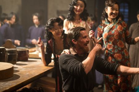 Christian Bale, Ni Ni, and Xinyi Zhang in The Flowers of War (2011)