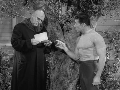 Jackie Coogan and Jack LaLanne in The Addams Family (1964)