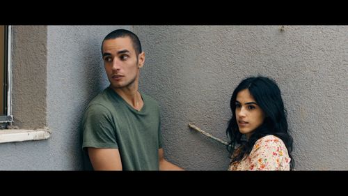 Adam Bakri and Leem Lubany in Omar (2013)