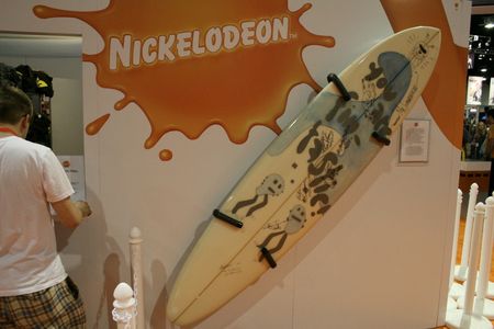 Surfboard autographed by cast members of SpongeBob to be auctioned for charity