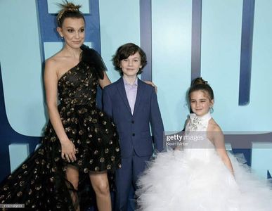 MAY 18: (L-R) Millie Bobby Brown, Tyler Crumley, and Lexi Rabe attends the premiere of Warner Bros. Pictures and Legenda