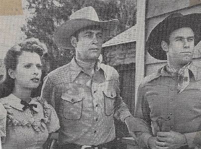 Carole Mathews, Tex Harding, and Charles Starrett in Outlaws of the Rockies (1945)