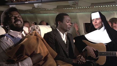 Norman Alexander Gibbs, Maureen McGovern, Tony Regan, and Al White in Airplane! (1980)