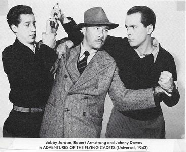 Robert Armstrong, Johnny Downs, and Bobby Jordan in Adventures of the Flying Cadets (1943)