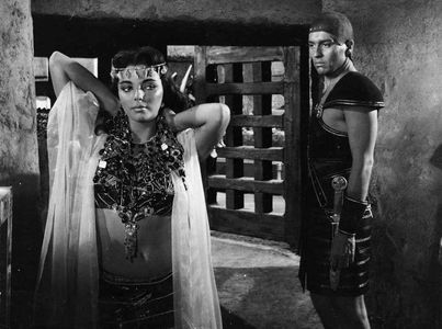 Joan Collins and Sydney Chaplin in Land of the Pharaohs (1955)