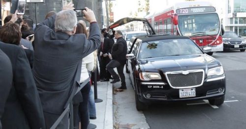 Tony DeGuide exits limo for a film premiere in Beverly Hills.