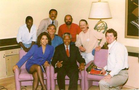 Stephanie Frederic and production team with South African President Nelson Mandela... moments after his historic victory