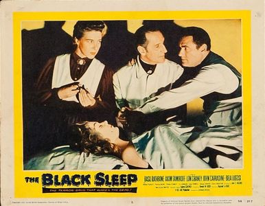 Basil Rathbone, Patricia Blair, Herbert Rudley, and Phyllis Stanley in The Black Sleep (1956)