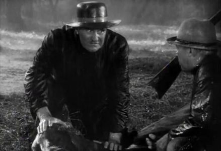 John Larkin and Ernest Torrence in Sporting Blood (1931)