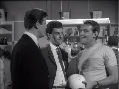 Roger Moore, Patrick Allen, and Robin Phillips in The Saint (1962)