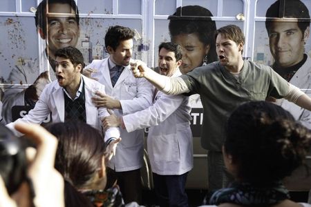 Ike Barinholtz, Chris Messina, Adam Pally, and Ed Weeks in The Mindy Project (2012)