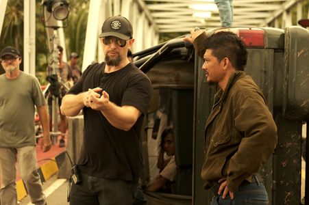 Liam O'Donnell and Iko Uwais behind the scenes of Warpath