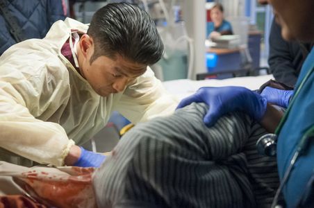 Brian Tee as Doctor Ethan Choi operating on Barton Fitzpatrick as the GSW Patient on Episode 5 Season 1 Chicago Med 'Mal