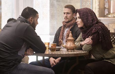 Jonathan Howard, Bridget Regan, and Faruk Amireh in The Last Ship (2014)