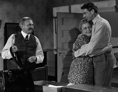 Gary Cooper, Elsa Janssen, and Ludwig Stössel in The Pride of the Yankees (1942)