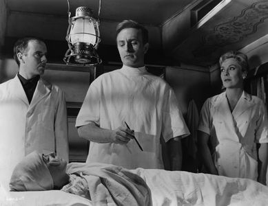 Anton Diffring, Kenneth Griffith, Jane Hylton, and Erika Remberg in Circus of Horrors (1960)