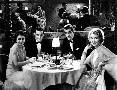 Boris Karloff, Lew Ayres, Sidney Fox, and Genevieve Tobin in The Cohens and Kellys in Hollywood (1932)