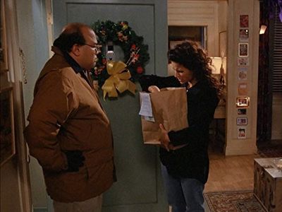 Julia Louis-Dreyfus and Martin Chow in Seinfeld (1989)
