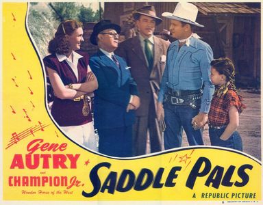 Gene Autry, Irving Bacon, Damian O'Flynn, Lynne Roberts, and Jean Van in Saddle Pals (1947)