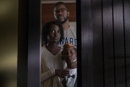 Lupita Nyong'o, Winston Duke, and Evan Alex in Us (2019)