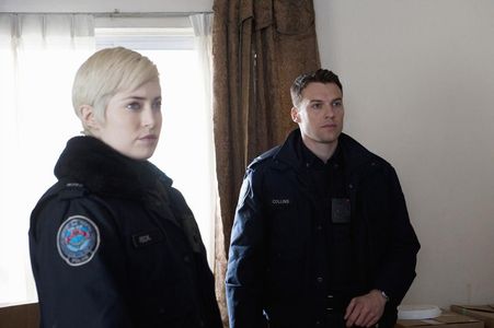 Charlotte Sullivan and Peter Mooney in Rookie Blue (2010)