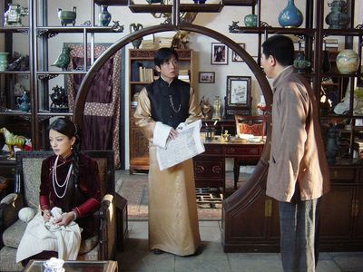 Yueming Pan and Wei Zhao in Moment in Peking (2005)