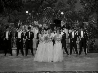 Laverne Andrews, Maxene Andrews, Patty Andrews, and Ted Lewis in Hold That Ghost (1941)