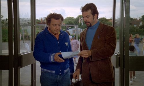 Coluche and Roland Giraud in Le maître d'école (1981)