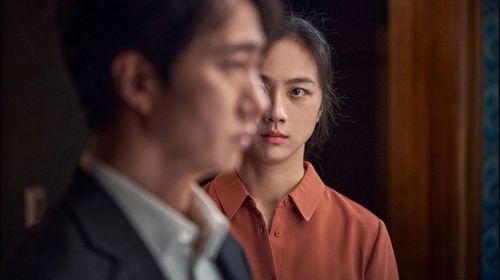 Park Hae-il and Tang Wei in Decision to Leave (2022)