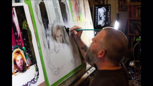 Renowned comic book artist, Tony Harris paints Lily Keene onto The World Is Big And Scary poster.