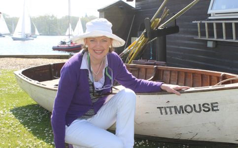 Sophie Neville with the dinghy used in Coot Club