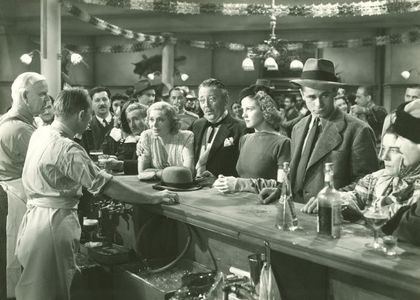 Glenn Ford, Eddie Collins, Tom McGuire, Marjorie Rambeau, Jean Rogers, and Raymond Walburn in Heaven with a Barbed Wire 