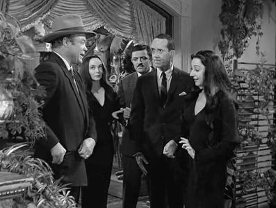 John Astin, Hal Baylor, Lee Goodman, Carolyn Jones, and Hazel Shermet in The Addams Family (1964)
