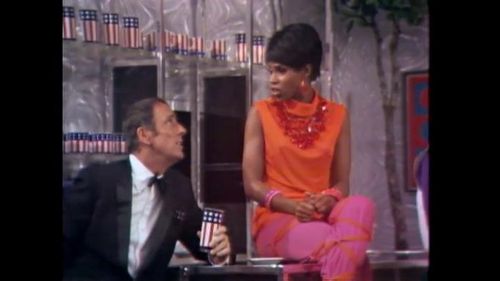 Chelsea Brown and Dick Martin in Rowan & Martin's Laugh-In (1967)