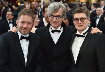 Wim Wenders, Juliano Ribeiro Salgado, and David Rosier at an event for The Oscars (2015)