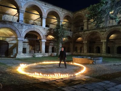 Michael Teh in the ring of fire in the film Angels Fallen, shot in Kursumli An, Skopje, North Macedonia