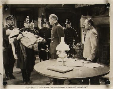 Joyce Coad, Paul Lukas, and Frank Reicher in Captured! (1933)
