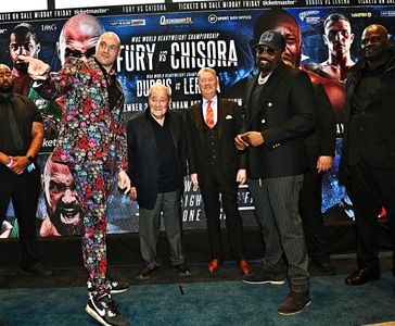 Bob Arum, Frank Warren, Tyson Fury, and Dereck Chisora in BT Sport Fight Night Live: Tyson Fury vs. Dereck Chisora III: 