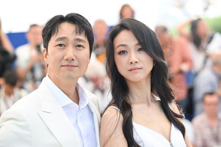 Park Hae-il and Tang Wei at an event for Decision to Leave (2022)