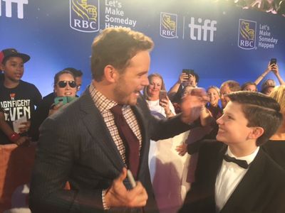 Dodge and Chris Pratt on the red carpet at the world premiere of The Magnificent Seven at the Toronto International Film