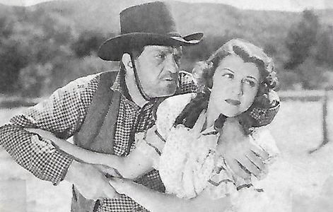 Franklyn Farnum and Dorothy Gulliver in In Early Arizona (1938)