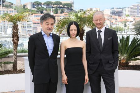 Tadanobu Asano, Eri Fukatsu, and Kiyoshi Kurosawa at an event for Journey to the Shore (2015)