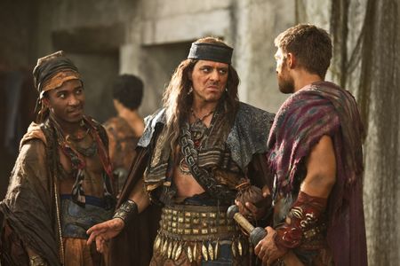 Vince Colosimo, Liam McIntyre, and Blessing Mokgohloa in Spartacus (2010)