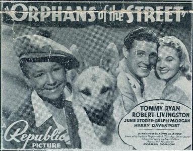 Robert Livingston, Tommy Ryan, June Storey, and Ace the Wonder Dog in Orphans of the Street (1938)