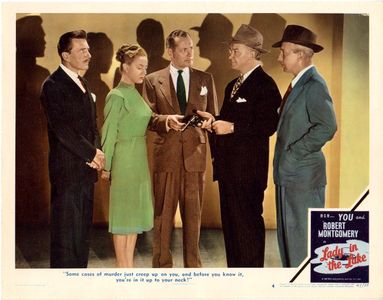 Leon Ames, Robert Montgomery, Lloyd Nolan, Audrey Totter, and Tom Tully in Lady in the Lake (1946)