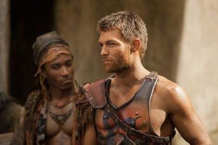 Liam McIntyre and Blessing Mokgohloa in Spartacus (2010)