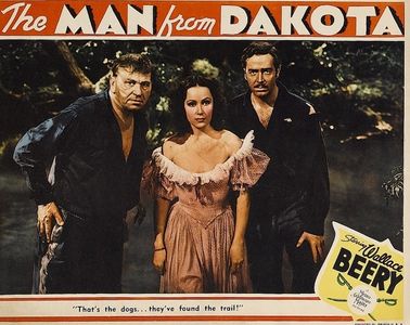 Wallace Beery, Dolores del Rio, and John Howard in The Man from Dakota (1940)