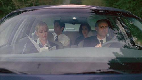 Gillian Anderson, David Duchovny, Scott Burkholder, and J.C. Wendel in The X-Files (1993)