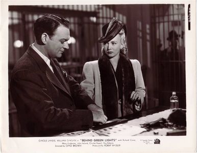 William Gargan and Carole Landis in Behind Green Lights (1946)